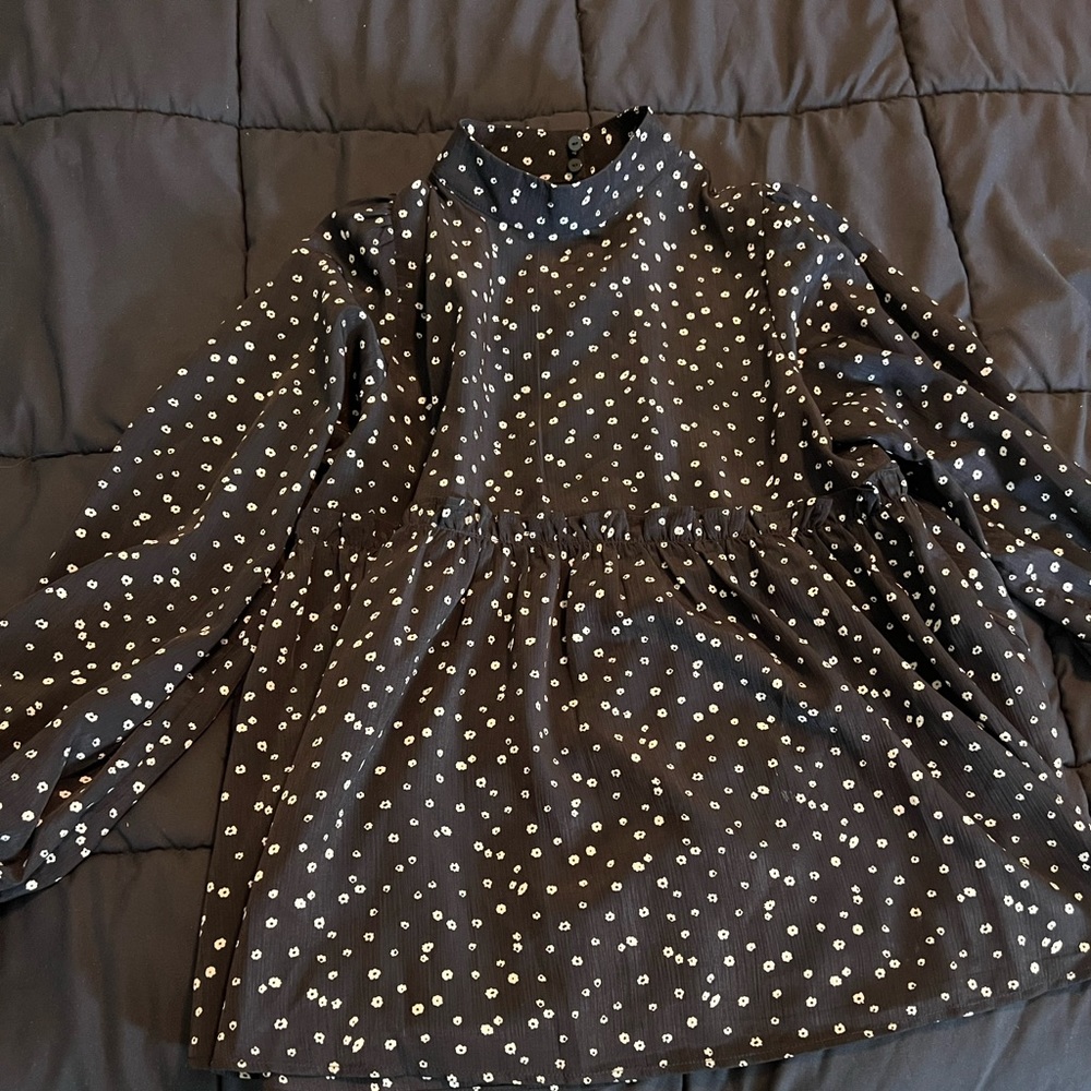 Black and white high neck belle sleeve top